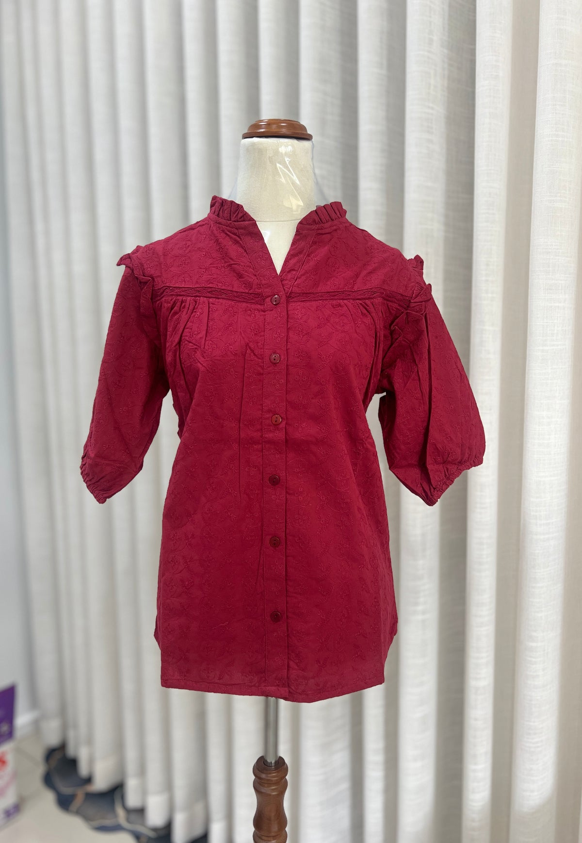 Mid-sleeve red buttoned top