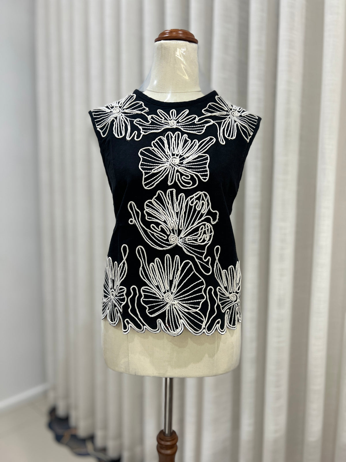 Sleeveless black top