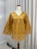 Yellow embroided long sleeve top