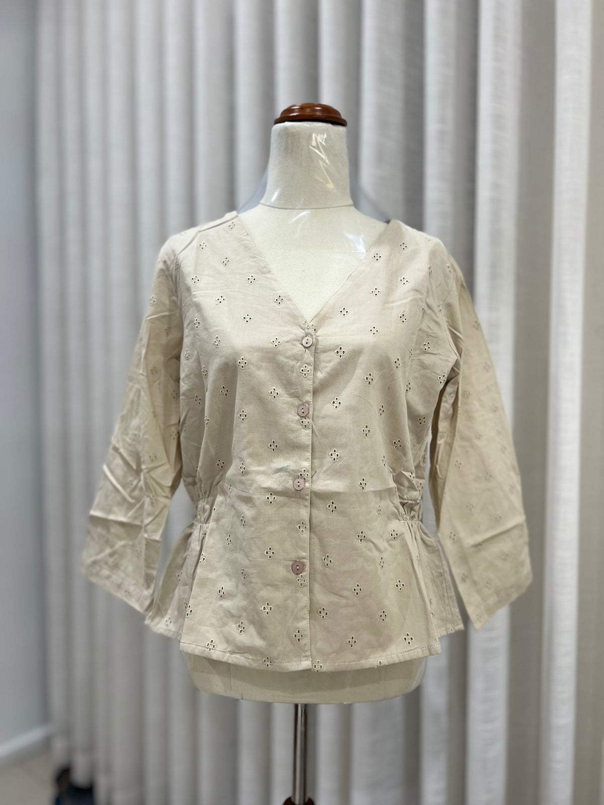 Beige buttoned top