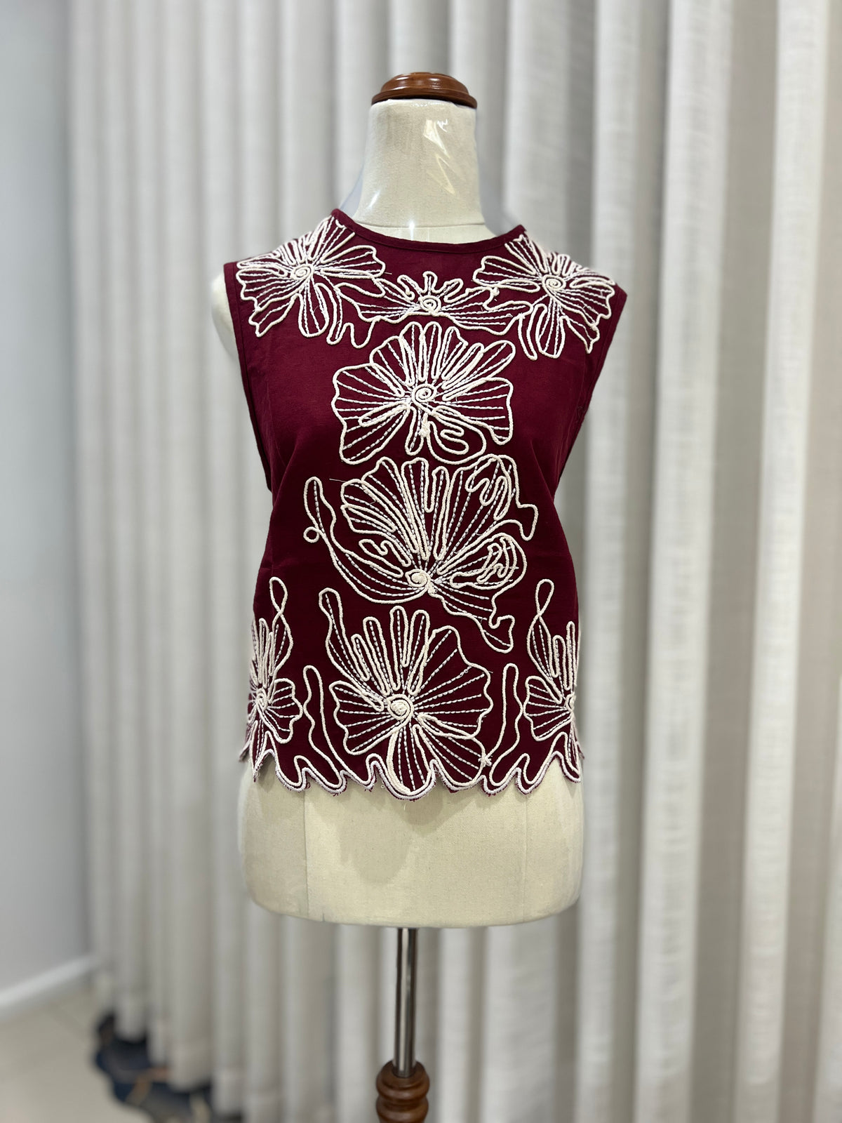 Sleeveless red top