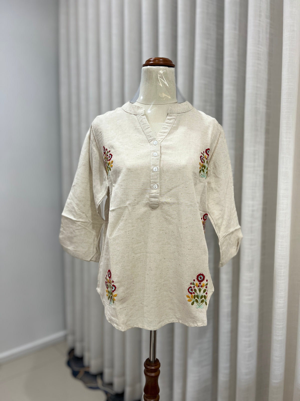 Mid sleeve embroided top